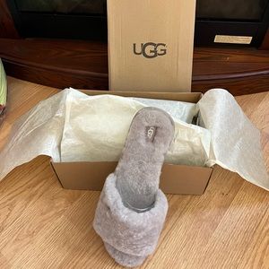 Grey fluffy UGG slippers
